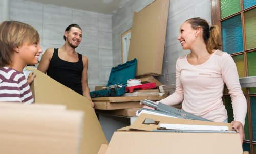 Local removals team planning a move in Ealing street