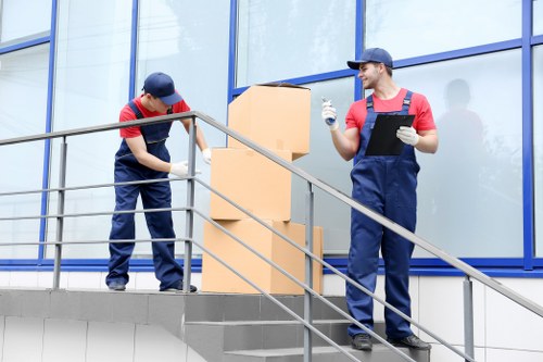 Local moving team helping with furniture transport in Ealing