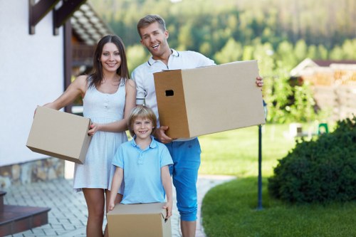 Packed moving boxes and furniture prepared for transport