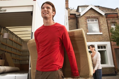 Van team preparing items for a house move in Ealing
