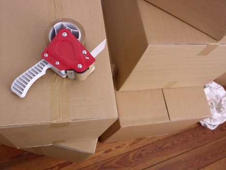 Packed boxes and household items ready for transport in Ealing
