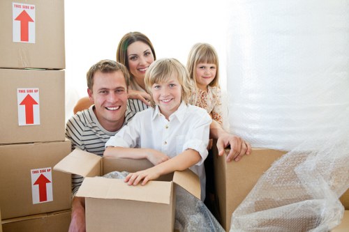 Furniture and boxes being loaded into a moving van in Ealing