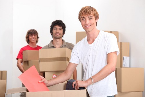 Packed boxes and furniture ready for transport