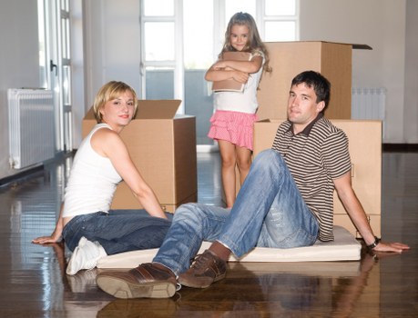Local team collecting a sofa from a home in Ealing